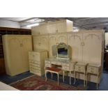 A Large Cream and Gilt Bedroom Suite Comprising Pair of Double Wardrobes with Raised Top Storage