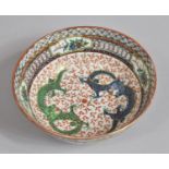 A Chinese Porcelain Bowl in the Famille Verte Palette Decorated with Green and Blue Dragons