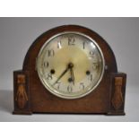 A Mid 20th Century Oak Westminster Chime Mantle Clock with Key and Replacement Pendulum