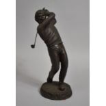 A Bronze Effect Resin Study of a Golfer, 27cm High