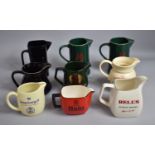 A Collection of Nive Various Advertising Pub Jugs to include Bells, The Famous Grouse, Haigs, J