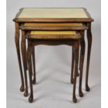 A Mid 20th Century Nest of Three Tables with Tooled Leather Top, 54cm Wide