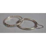 Two Babies Silver Bangles, One Adjustable the Other Having Clasp and Safety Chain