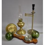 A Collection of Various Items to include Brass Oil Lamp, Dish, Table Lamp, Two Glass Plates and a