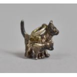 A Small Silver Charm in the Form of Cat and Kitten