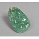 A Chinese Green Jade Carved Pendant with Gourd Decoration. 5cms High
