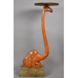 An Early 20th century North African Dumbwaiter/Visiting Card Stand, Modelled as a Seated Camel, with