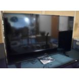 A Digihome 50" UHD Smart 4k Television with Remote