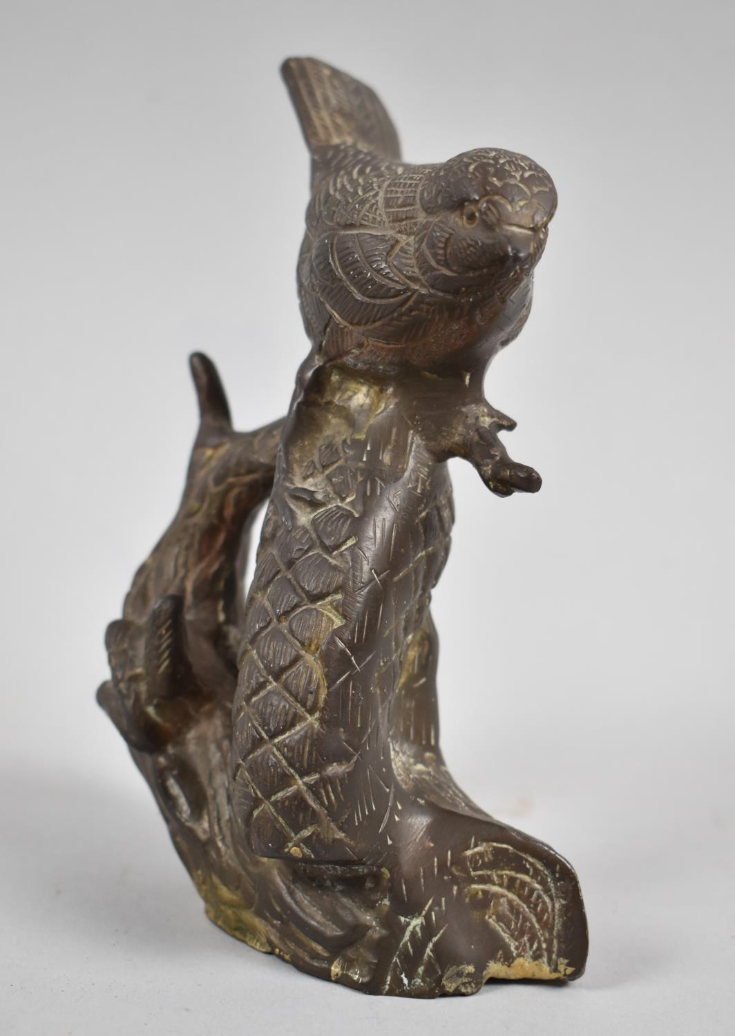 A Heavy Cast Brass Study of a Bird Perched on Pine Cone, 15cm high