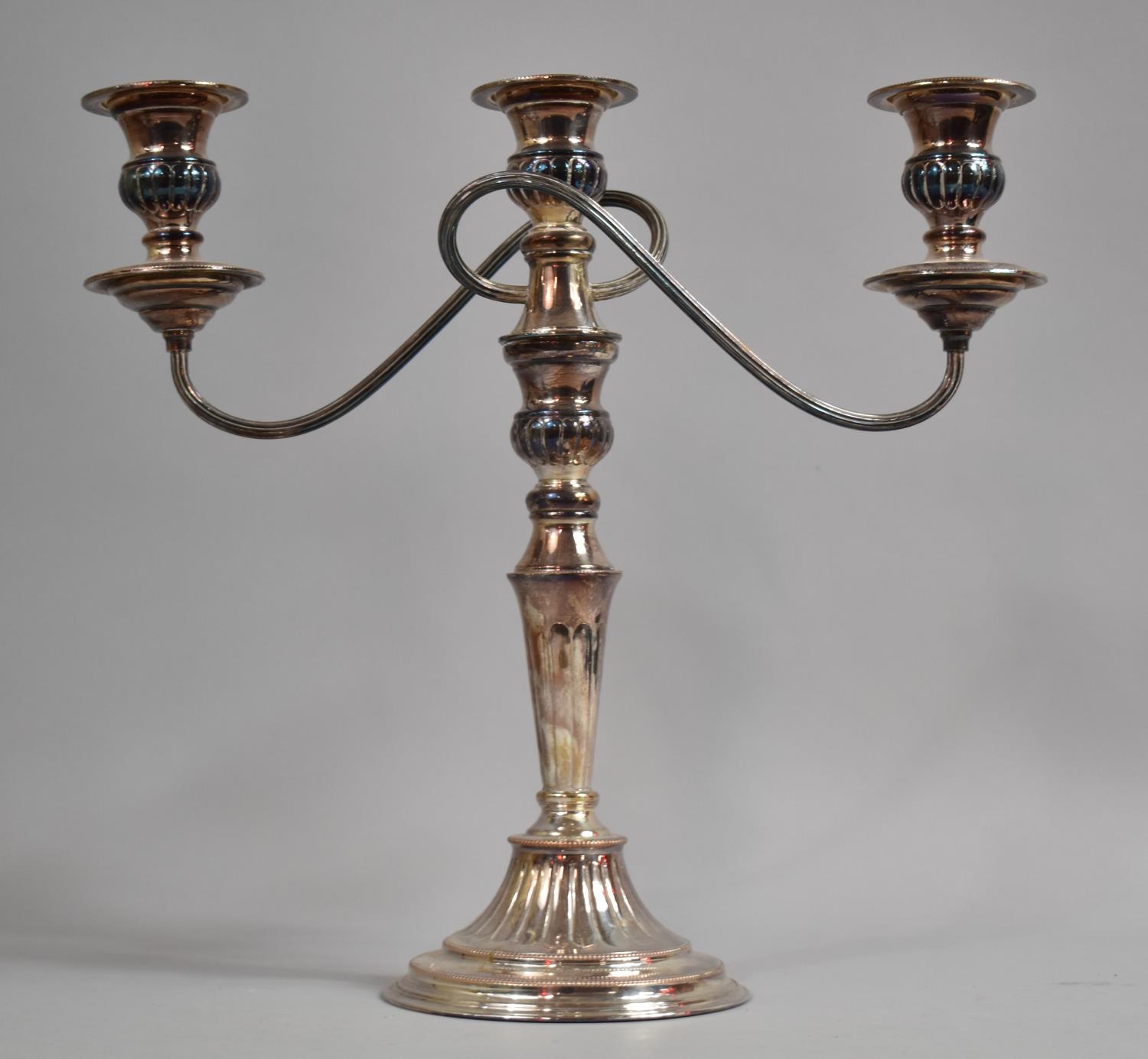A Large Weighted Sheffield Plated Three Branch Candelabra by Elkington, 36cm High