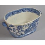 A 19th Century Blue and White Willow Pattern Two Handled Planter, 27cm wide