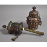 A Tibetan White Metal Prayer Wheel with Cabochon Decoration Together with a Similar Lidded Vase,