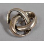 A Silver Brooch in the Form of Eternal Loop, not Stamped but Tests for Silver