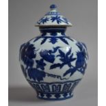 A Chinese Blue and White Lidded Vase of Bellied Form Decorated with Peaches on Branches, Geometric