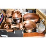 A Collection of Various Copperwares to Include Oval Planter with Brass Claw Feet, Measuring Jugs,