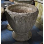 A Reconstituted Stone Garden Urn, 48cm Wide Together with a Reconstituted Circular base