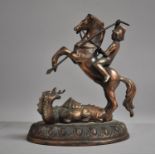A Mid 20th Century Copper Plated Metal Study of St. George and the Dragon, 25cm high