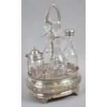 A Silver Plate and Glass Four Bottle Oval Cruet Set, 27cm high