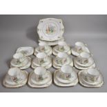 A Tuscan China Plant Pattern Tea Set to comprise Eleven Cups, Nice Saucers, Eleven Side Plates,