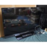 A Sony 36" TV with Remote