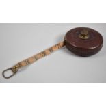 A Vintage Leather Cased Tape Measure by Abbey & Sons