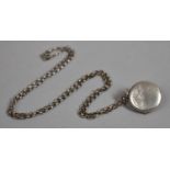 A Circular Silver Locket on Silver Chain both Stamped Sterling