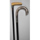 Two Silver Mounted Ebonised Walking Canes, One with Horn Handle, 88cm Long