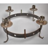 A Modern Wrought Iron Circular Four Branch Candle Stand, 27cm diameter, Scrolled Feet