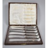 A Set of Six Silver Handled Pistol Grip Butter Knives