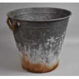 A Weathered Pressed Metal Bucket with Two Rope Handles, 40cm diameter