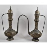 A Pair of North African Niello Style Brass Coffee Pots with Islamic Decoration, Each 50cm high