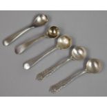 A Collection of Five Silver Condiment Spoons to Include Pair of Decorated Examples, Various