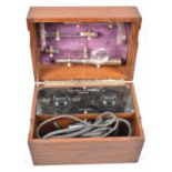 A Vintage Oak Cased Electric Shock Machine by John Bell & Croydon, London