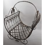 A Modern Metal Log Basket on Scrolled Support, 45cm long