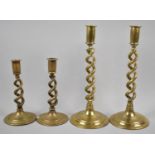 Two Pairs of Spiralled Brass Candlesticks, 19cm and 30cm high
