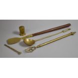 A Long Brass Ladle, Brass Toasting Fork, Brass and Wooden Spoon and a Brass Wig Duster