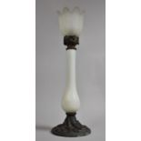 A Victorian Opaque Glass and Brass Rise and Fall Candle Stand on Cast Naturalistic Circular Base,