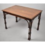 A Modern Mahogany Rectangular Occasional Table on Triple Turned Supports, 69cm wide