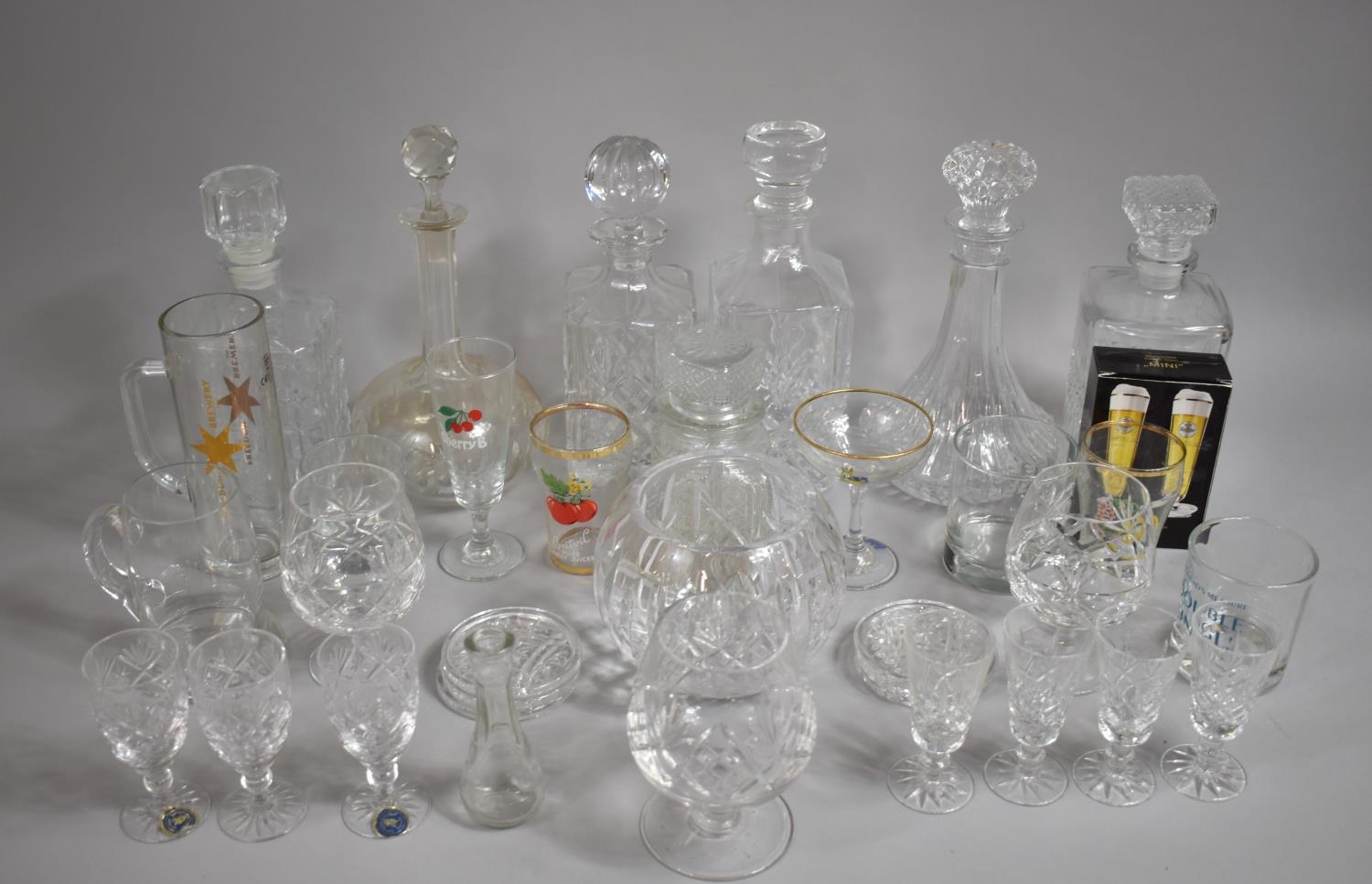A Collection of Various Moulded and Cut Glassware to comprise Decanters, Brandy Balloons, Sherry