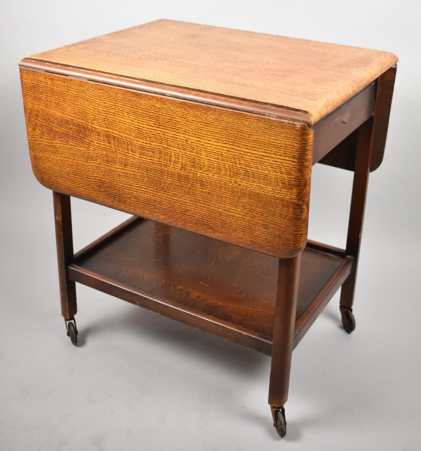 A Mid 20th Century Oak Drop Leaf Two Tier Trolley with End Drawer, 60cm wide