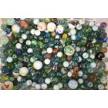 A Collection of Vintage and Later Glass Marbles of Various Sizes
