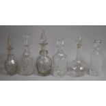 A Collection of Various Decanters to comprise Mallet, Globe and Stalk Etc