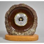 A Souvenir Serpentine Marble Aneroid Barometer on Wooden Oval Plinth, 18cm high