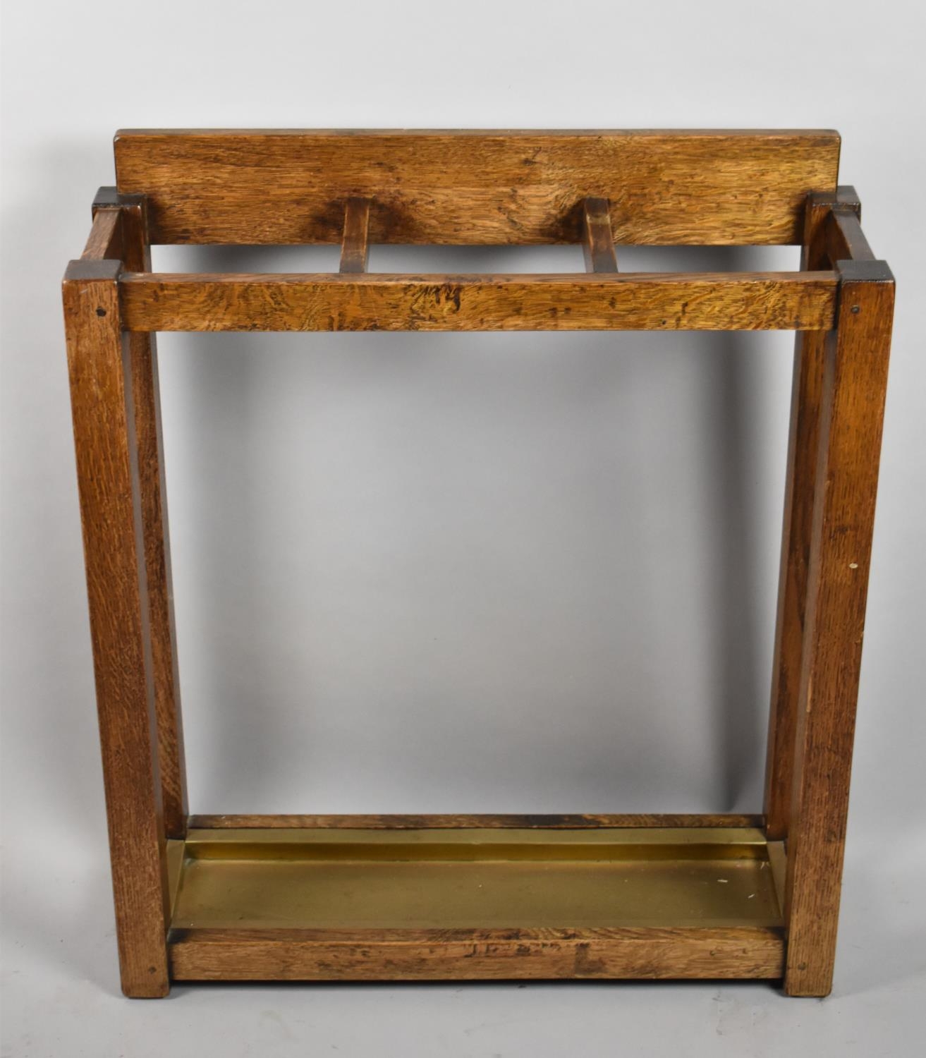 An Art Decio Oak Three Section Stick Stand with Brass Drip Tray, 66cm long