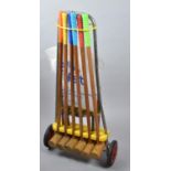 A Late 20th Century Child's Croquet Set, One Mallet Split