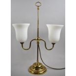 A Modern Brass Two Branch Adjustable Table Lamp with Opaque Glass Shades, 55cm high