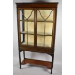 An Edwardian String Inlaid Mahogany Display Cabinet with Two Inner Shelves, Tapering Supports with