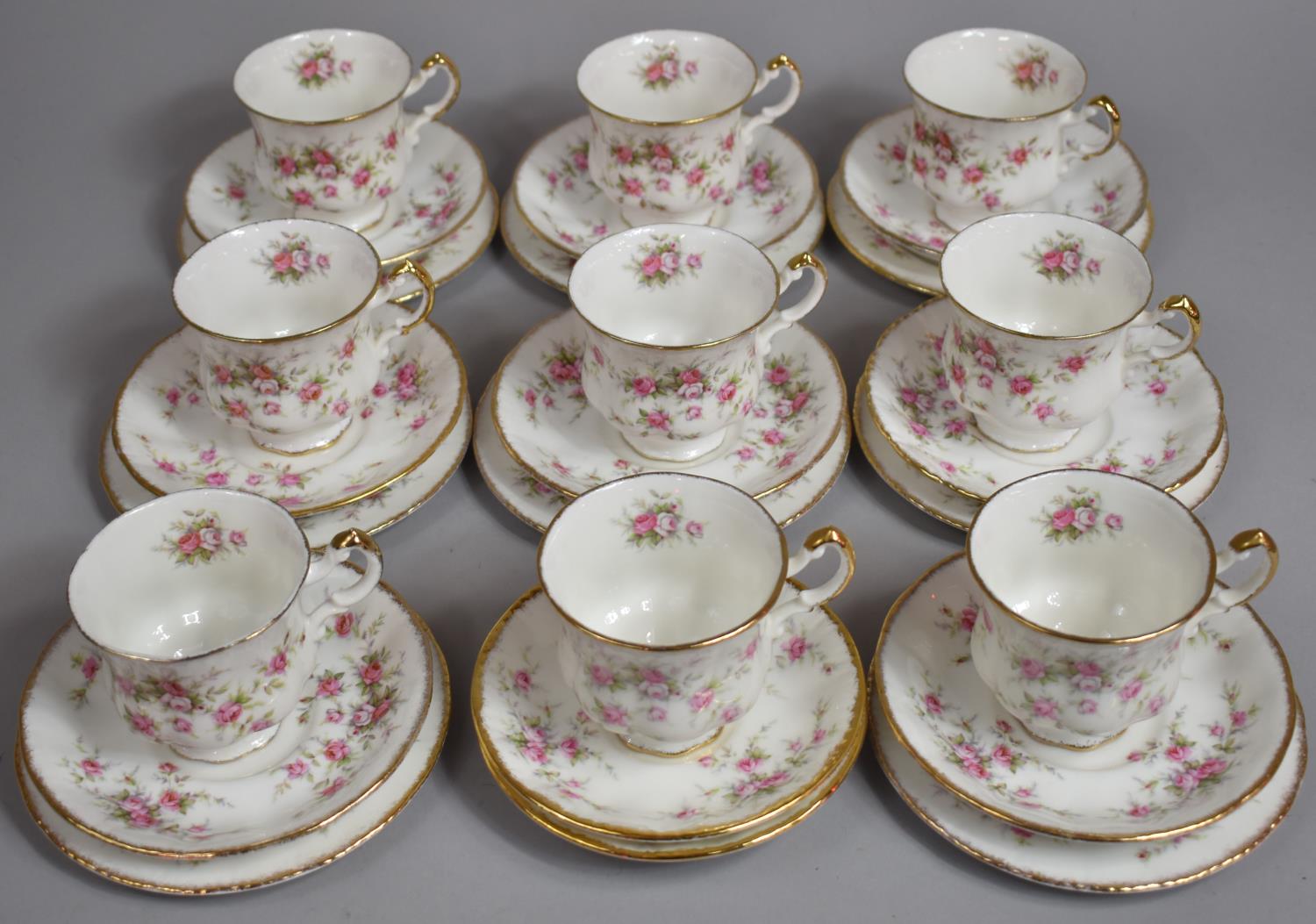 A Collection of Paragon Victoriana Rose Pattern Teawares to comprise Nine Teacups, Eight Large