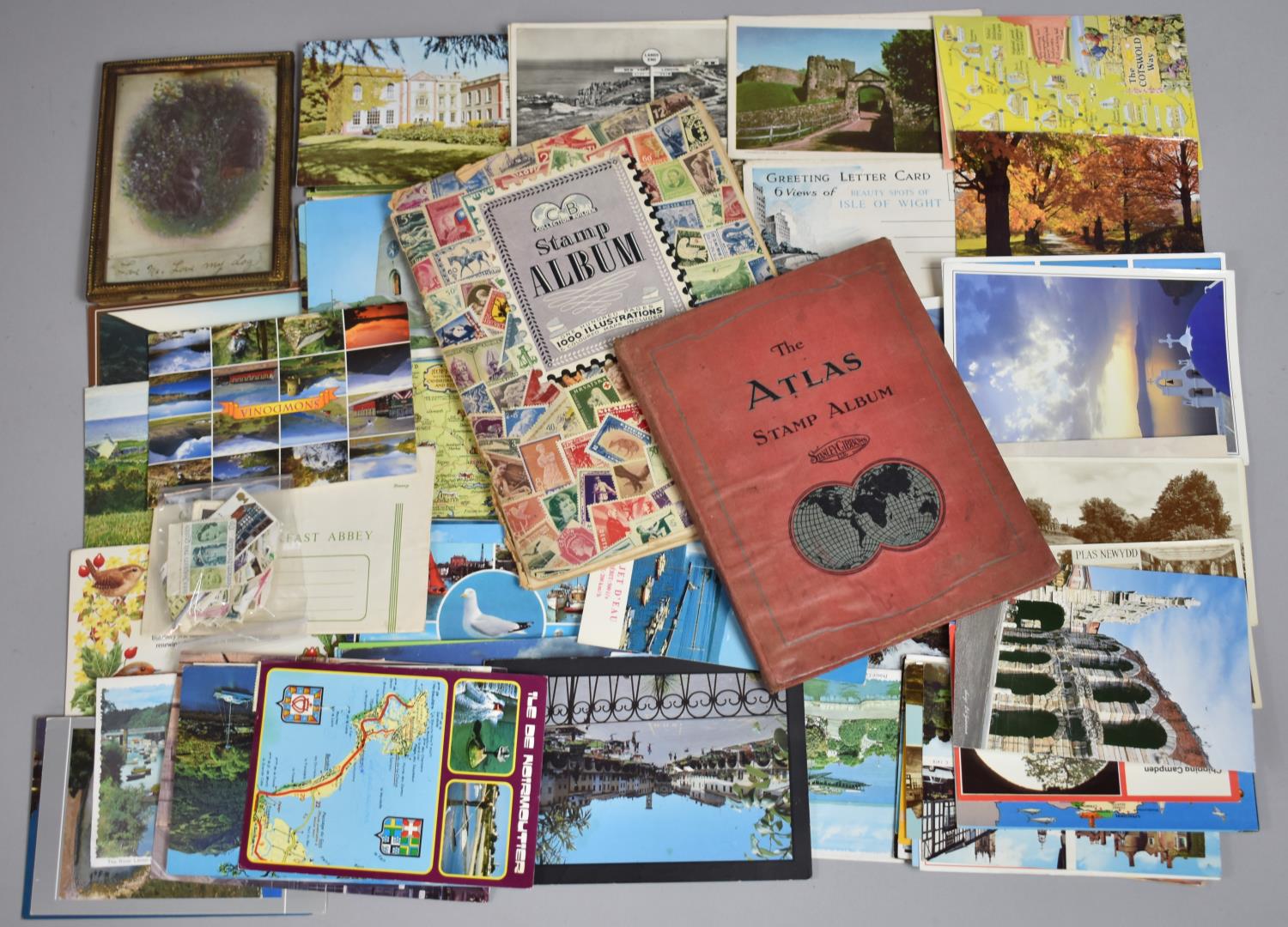 Two Children's Stamp Albums and Contents Together with Postcards etc