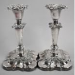 A Pair of Silver Plated Candlesticks, 19cm high